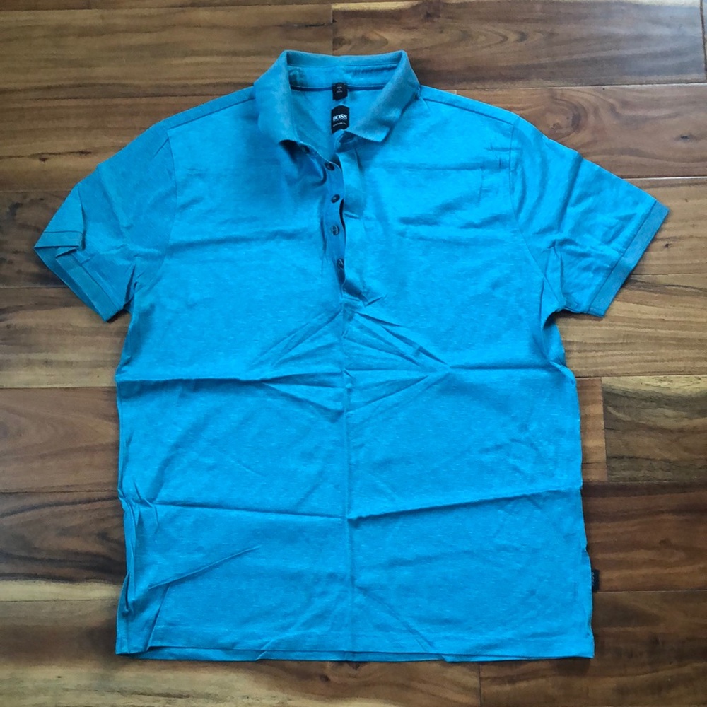 Boss Polo teal green with silver stripe. Originally from Bloomingdales. Size L.